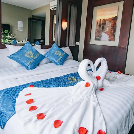 V Hotel Vientiane Bagian luar foto