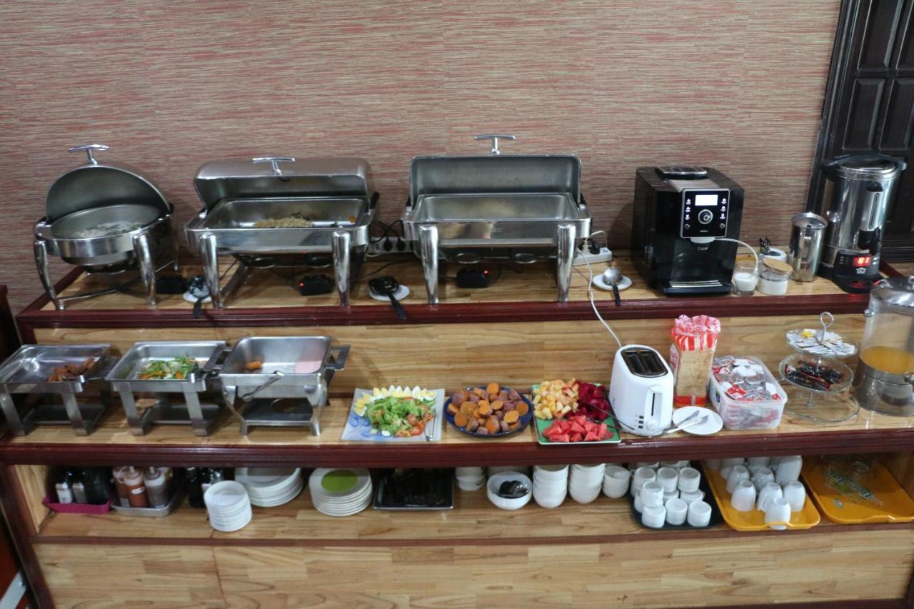 V Hotel Vientiane Bagian luar foto