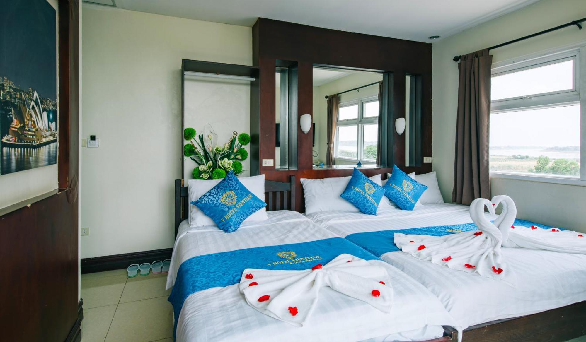 V Hotel Vientiane Bagian luar foto