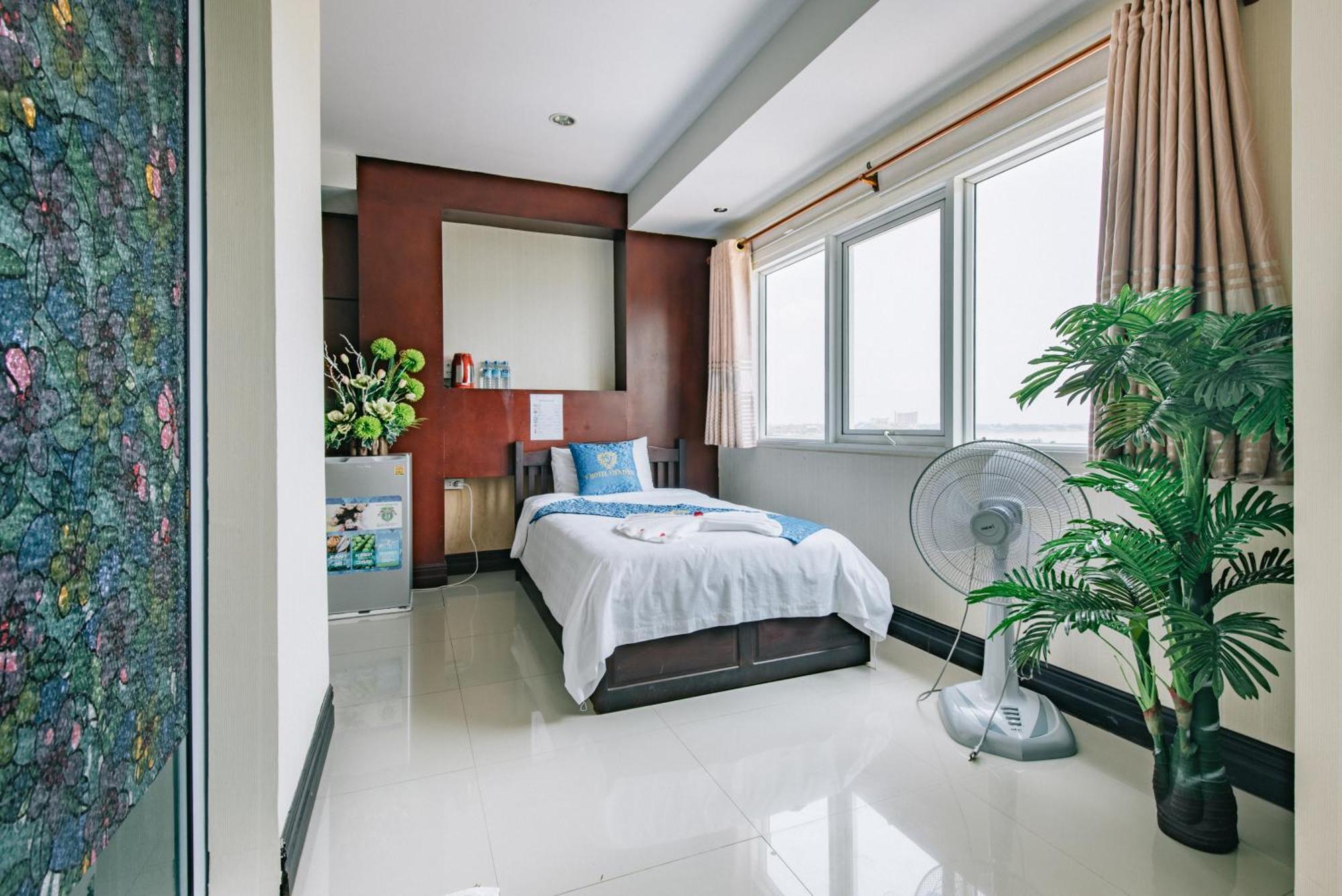 V Hotel Vientiane Bagian luar foto