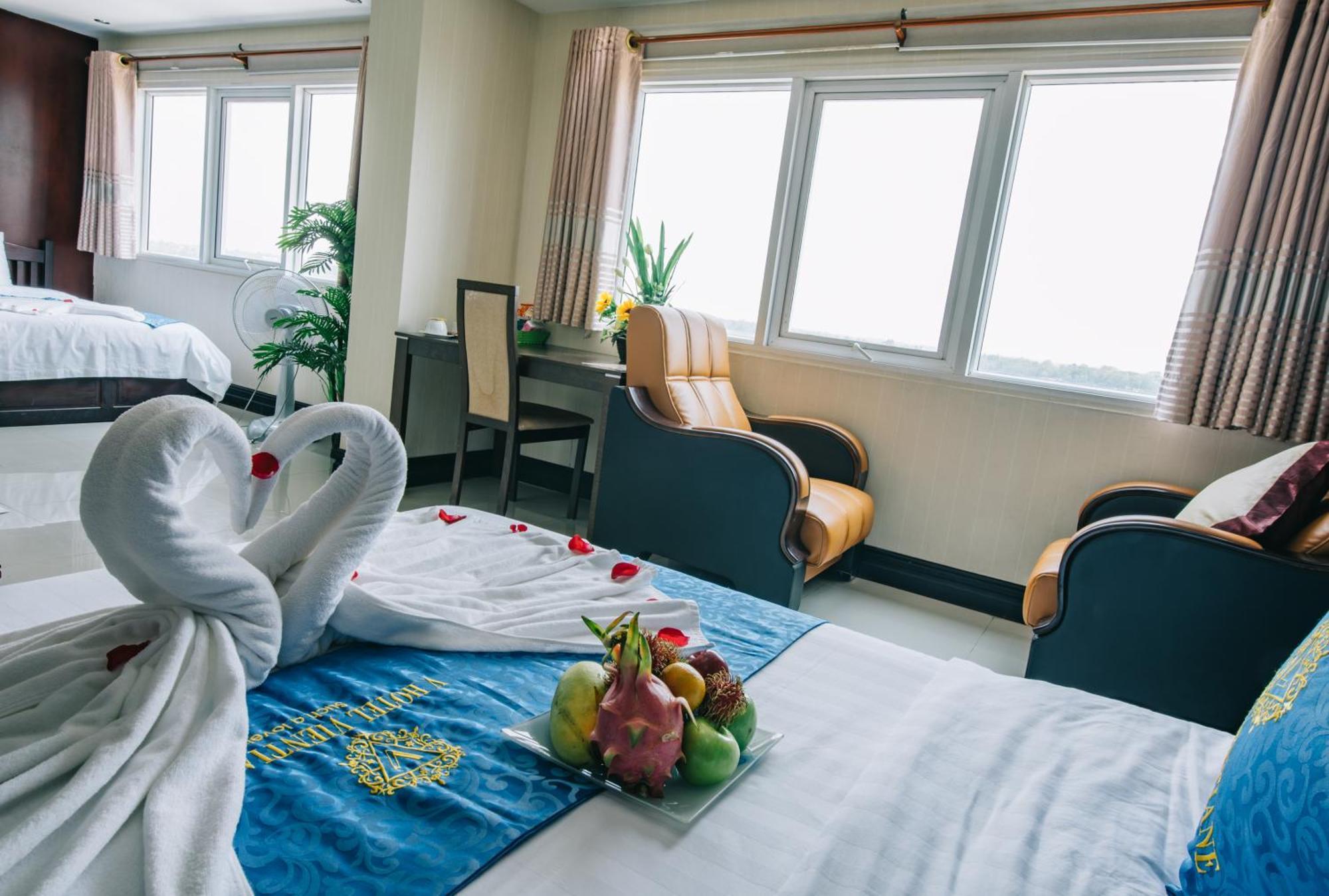 V Hotel Vientiane Bagian luar foto