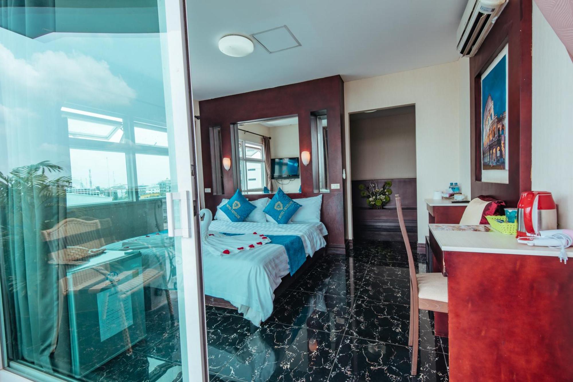 V Hotel Vientiane Bagian luar foto