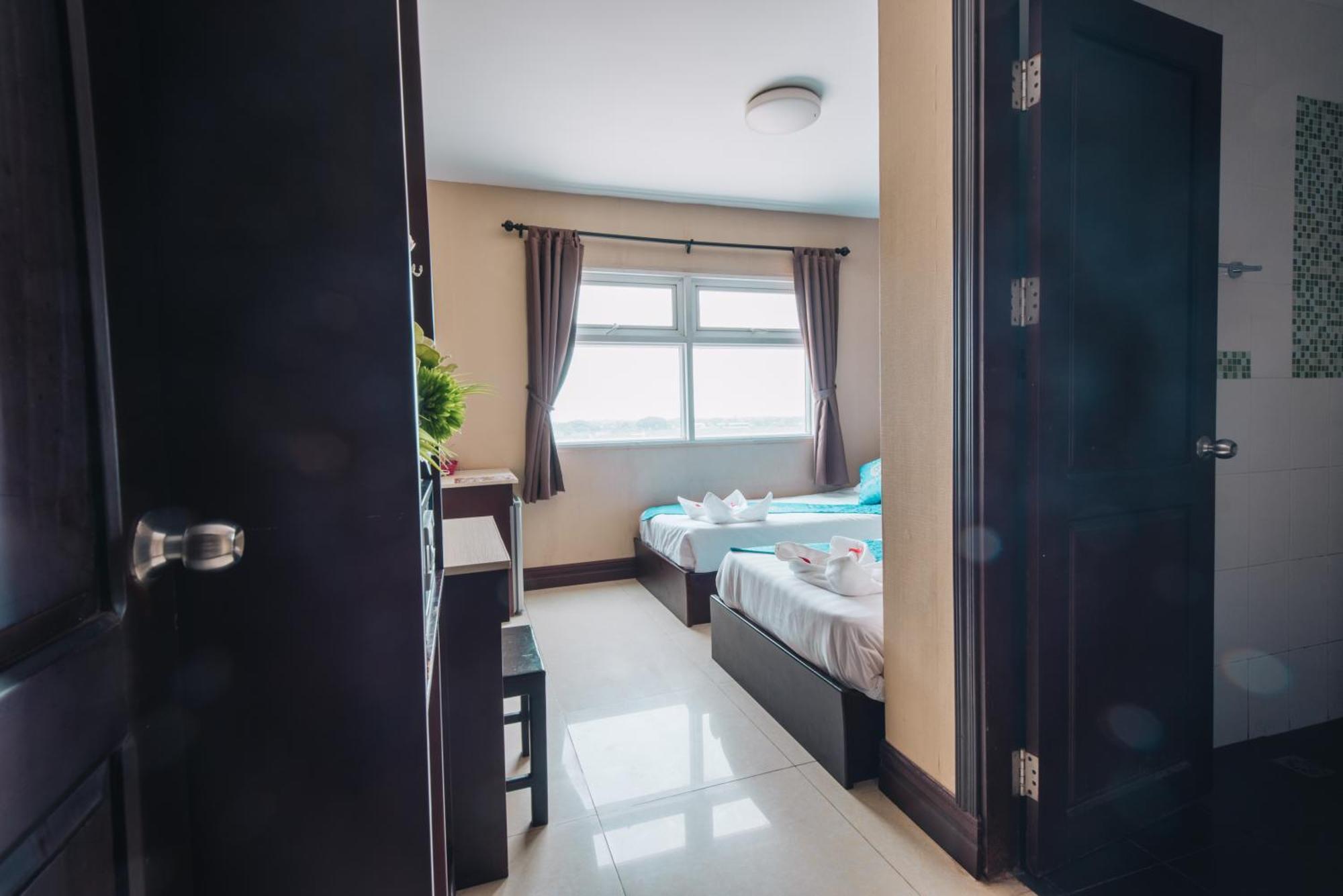 V Hotel Vientiane Bagian luar foto