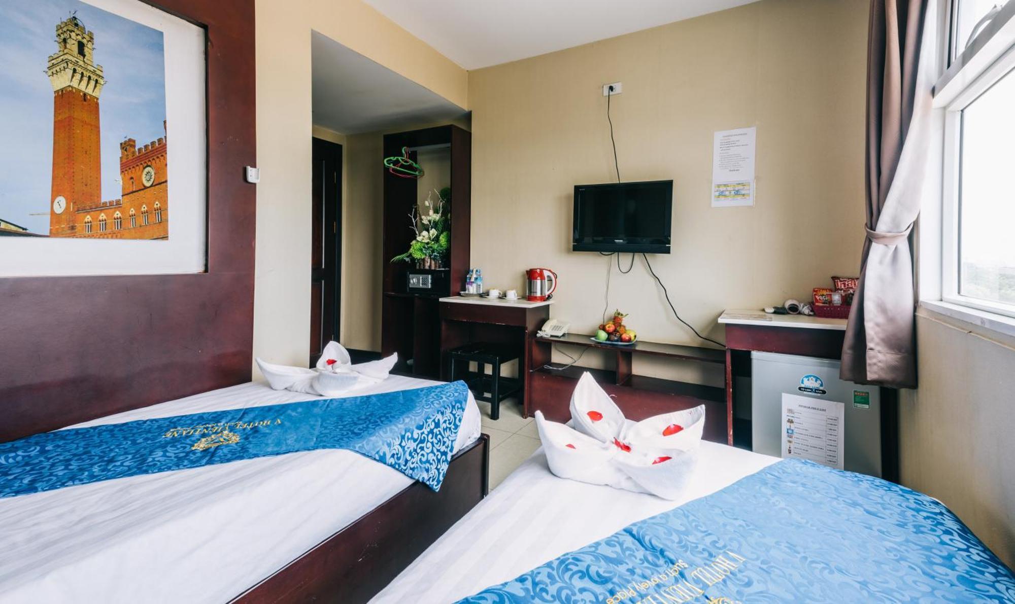 V Hotel Vientiane Bagian luar foto