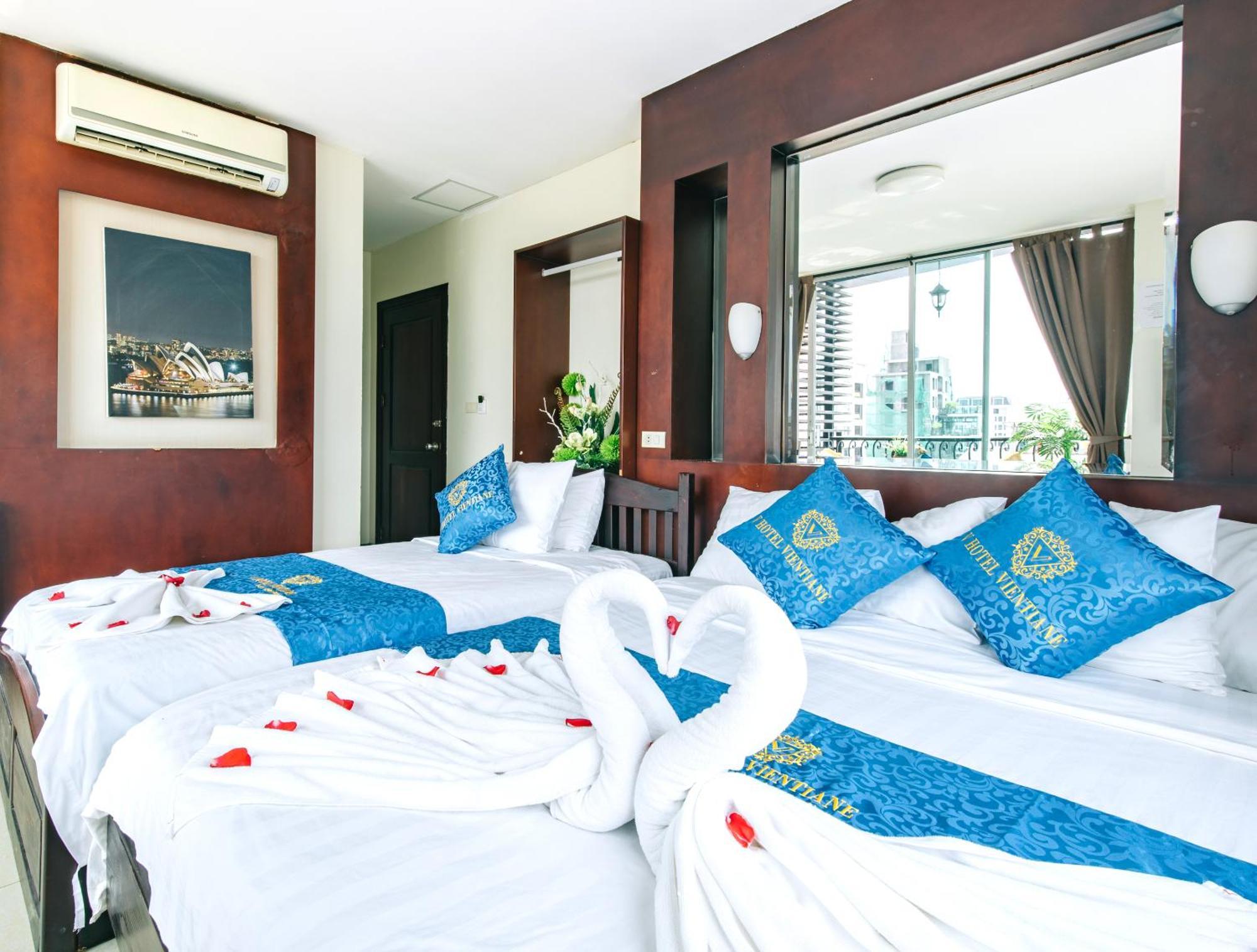 V Hotel Vientiane Bagian luar foto