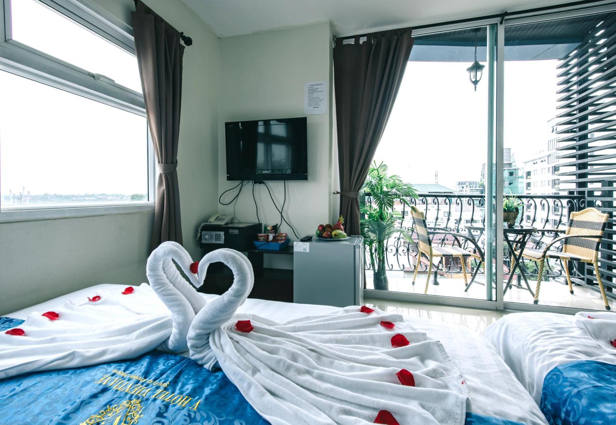 V Hotel Vientiane Bagian luar foto
